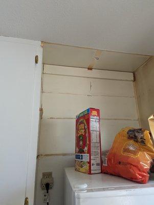 Cabinet removed, never replaced.