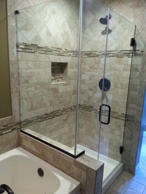 Shower enclosure custom designed and expertly installed. We believe in clean in, clean out installations.