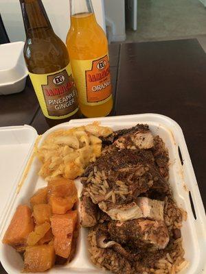 Jerk chicken with Mac and cheese / yams. Jamaican drinks