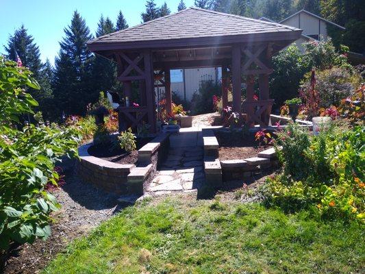 Retaining walls, slate pathway, and painting