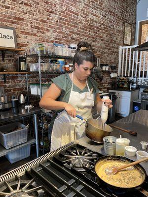 Prepping our tomato bisque, Marsala sauce simmering