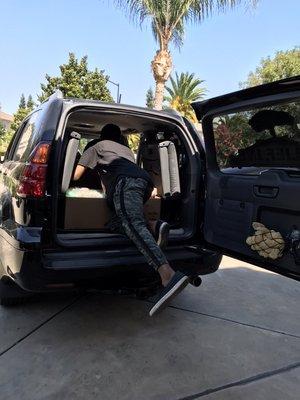 Loading bread, bagel & pastries for delivery to the Modesto Gospel Mission.