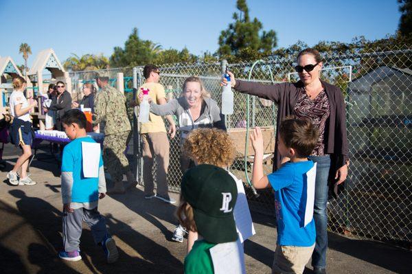 Parents keeping the kids cool at the Gator Run