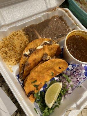 Birria plates with beans and rice