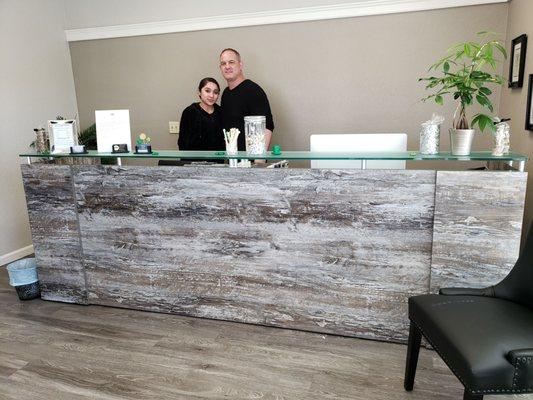 Dr. Strand and Stephanie in the reception area.