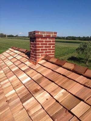 new Cedar shingles and copper Flashing