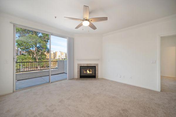 Living Room with gas fireplace at Missions at Rio Vista Apartments in San Diego