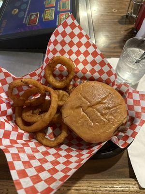 Bacon and American cheese on a delicious burger with awesome onion rings!