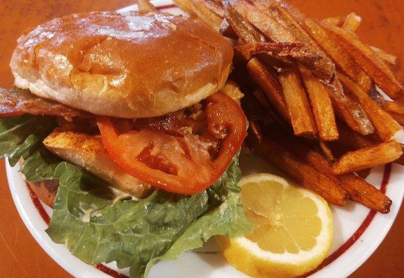 Salmon sandwich with hand cut fries