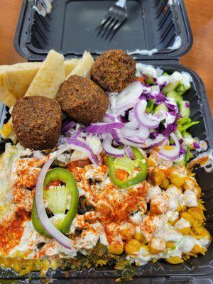 My vegetarian platter -falafel added, ate the other 2 before the pic, they are really good. I'm not vegetarian. It's just that good.