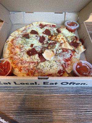 Pepperoni pizza and cheese bread with pepperoni and sausage.