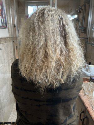 Hair is now washed, see the damage done, hair is burned, fried, curl pattern turned into permanent frizz. Hair broken in pieces.