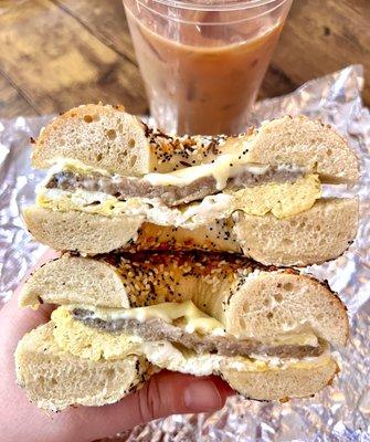 Sausage egg and cheese on an everything bagel With a large iced coffee