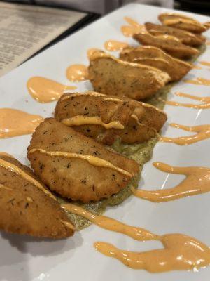 Fried ravioli with pesto and Sriracha mayo