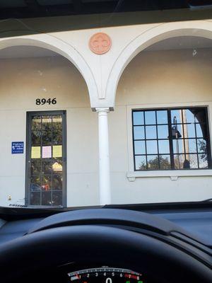 Front door.  Patients have to wait in their cars until called in (which has been less than ten minutes).