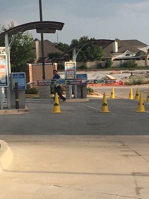 Closed carwash in front of my car at 6:53. Sign says 7:00. Mgr told him to.