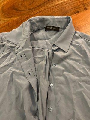 A brand new MaxMara blouse after requesting dry cleaning.