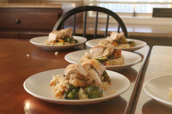 Chicken with risotto and roasted squash and Brussels sprouts