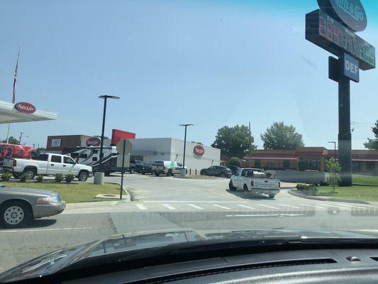 East Main Street, one way street ... cars shouldn't be crossing over another car to enter the parking lot.  kum N Go, Jacksonville,Ar 72076