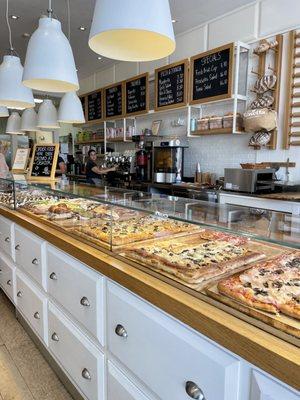 The interior decor is gorgeous - white bright and clean - the food in the display cases act as eye candy and pops of color. GORG!