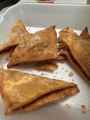 Crab Rangoon. Burnt and looks nothing like what thy advertise. the other item which is also burnt from being deep fried (A6. Pot Stickers)