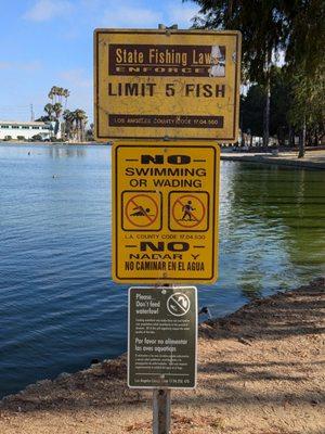 Signs by the pond