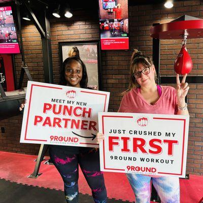 Punch Partners "Breezy" and "Candy Girl" posing after their dynamic sweat sesh at 9ROUND Kickboxing Fitness