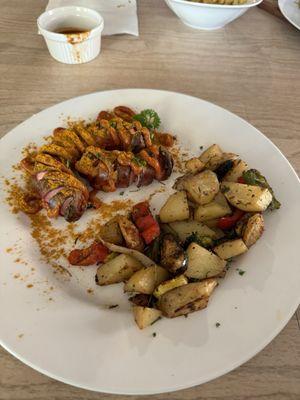 Currywurst with potatoes