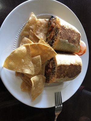 Burrito al pastor, with freshly fried chips.  Delish