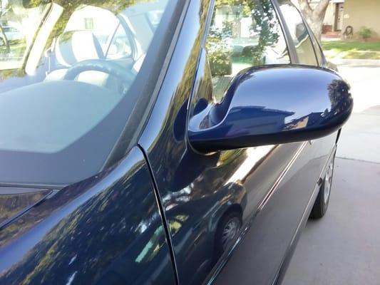 Driver's side mirror repainted