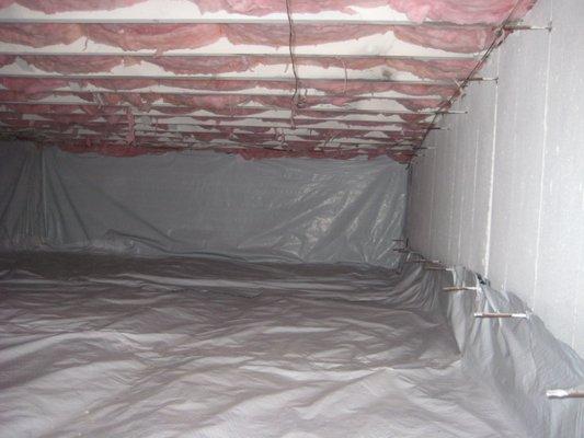 After. This is a typical 6 Mil Poly mesh reinforced vapor barrier install.