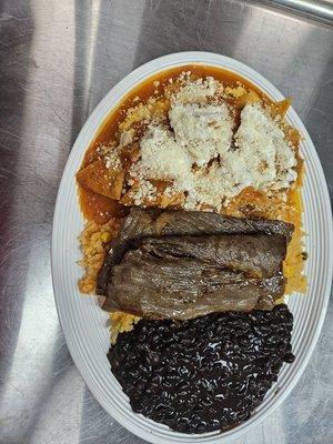 Red souce chilaquiles with steak