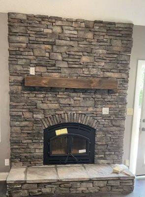 High Efficiency wood burning fireplace, new mantel and stone work