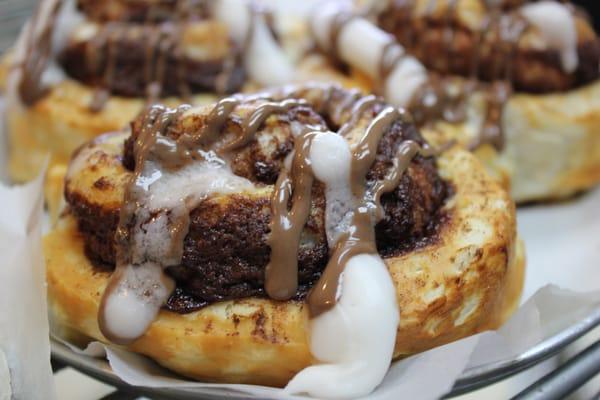 Cinnamon Roll drizzled in chocolate and icing