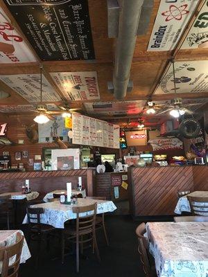 Walk up order and buffet to choose from. Advertising signs and nostalgia on ceiling.