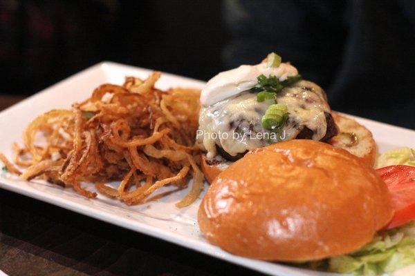 Jalapeno Jack Burger ($14) - beef mixed w/ chopped jalapeno, topped with monterey jack, scallions & sour cream. With brioche bun.