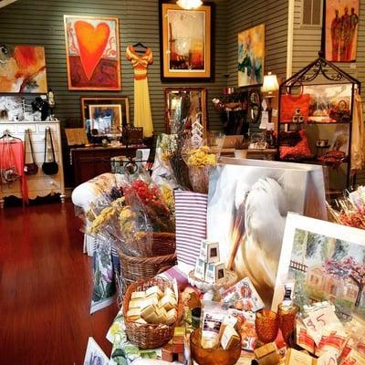 Experience our lovely shop with it's local art, designer clothing, home decor, gifts...truly unique!