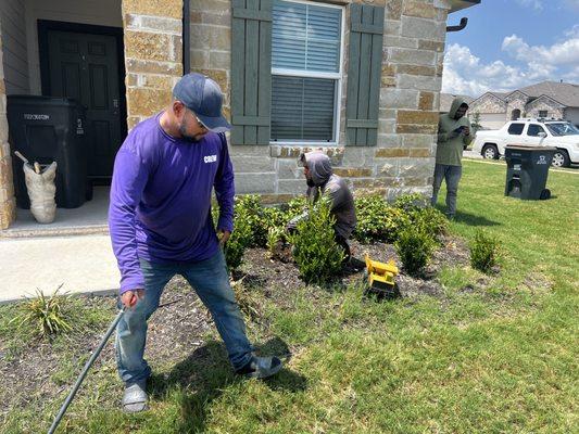 Double checking to make sure the area is cleaned up from debris!