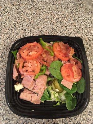 Salad ($6.99) with double meat (+$1.50) and bacon (+$1). $10.33.