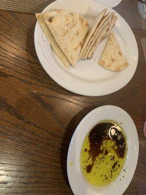 Pita bread and olive oil and balsamic vinegar appetizer