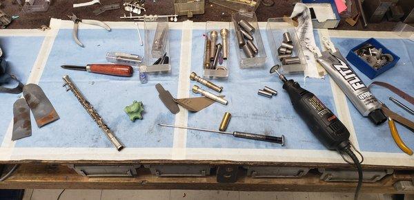 Some of the tools used for piccolo tone hole resurfacing/polishing.