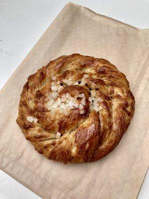 Cardamom bun - traditional Swedish sweet roll highlighting cardamom and topped with pearl sugar