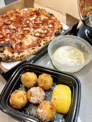 takeout pepperoni pie, burrata ball, and baby arancini