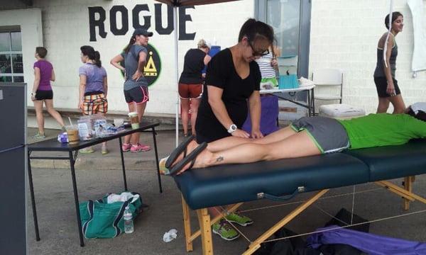 Providing acupuncture to runners at Rogue running