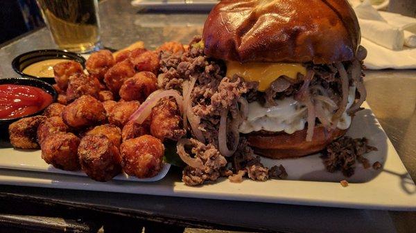 Philly cheese burger with sweet potato tater tots.