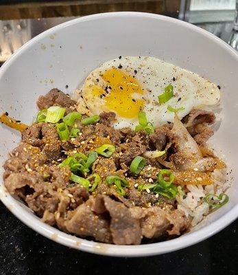 Kobe beef with fried egg over rice