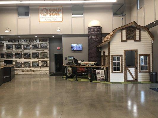 Our Lobby pays tribute to our humble beginnings and continuation on the Nordstrom family dairy farm.