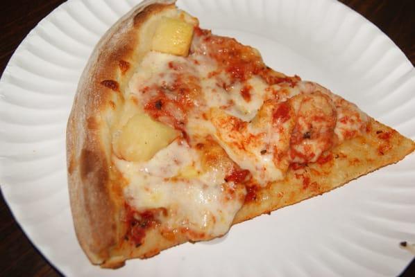 A slice of their pineapple pizza.