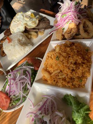 Pictured here Bistek A La Pobre and Trio Marítimo (ceviche- fried calamari, shrimp and octopus- seafood rice)