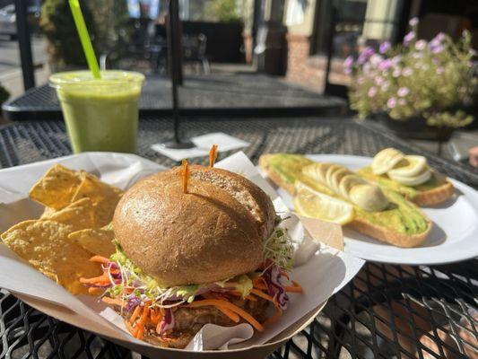 Tempeh Burger, Avocado Toast with Hard Boiled Egg, Mango Tango with Kale smoothie.